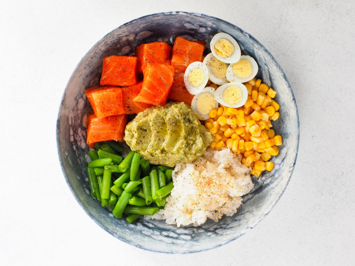Placeholder: high-protein bowl with salmon, eggs and vegetables