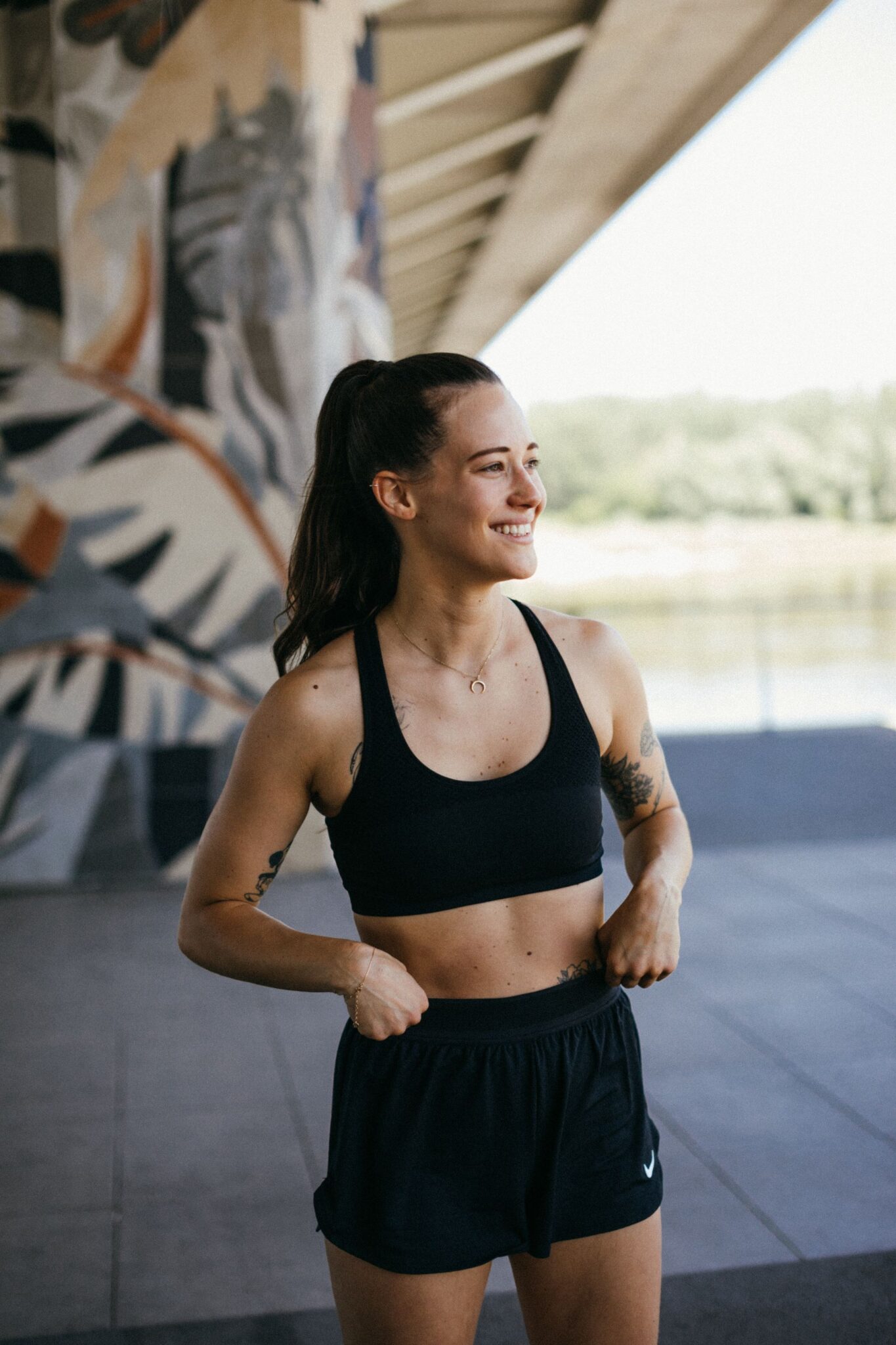 Placeholder: confident woman in activewear after training